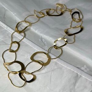 Delicate gold colored link necklace by Aura